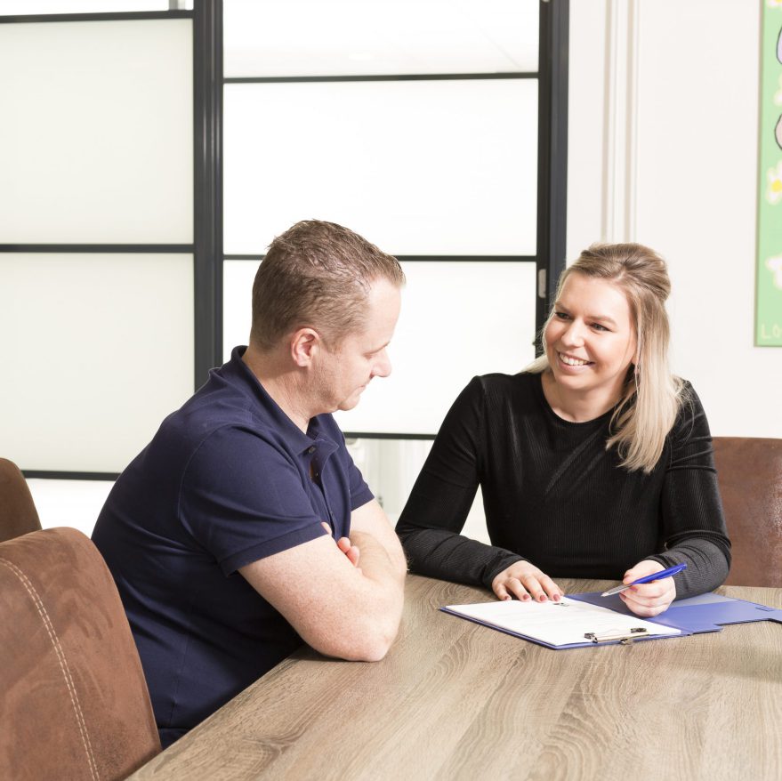 Consultgesprek tussen tandarts en patiënt